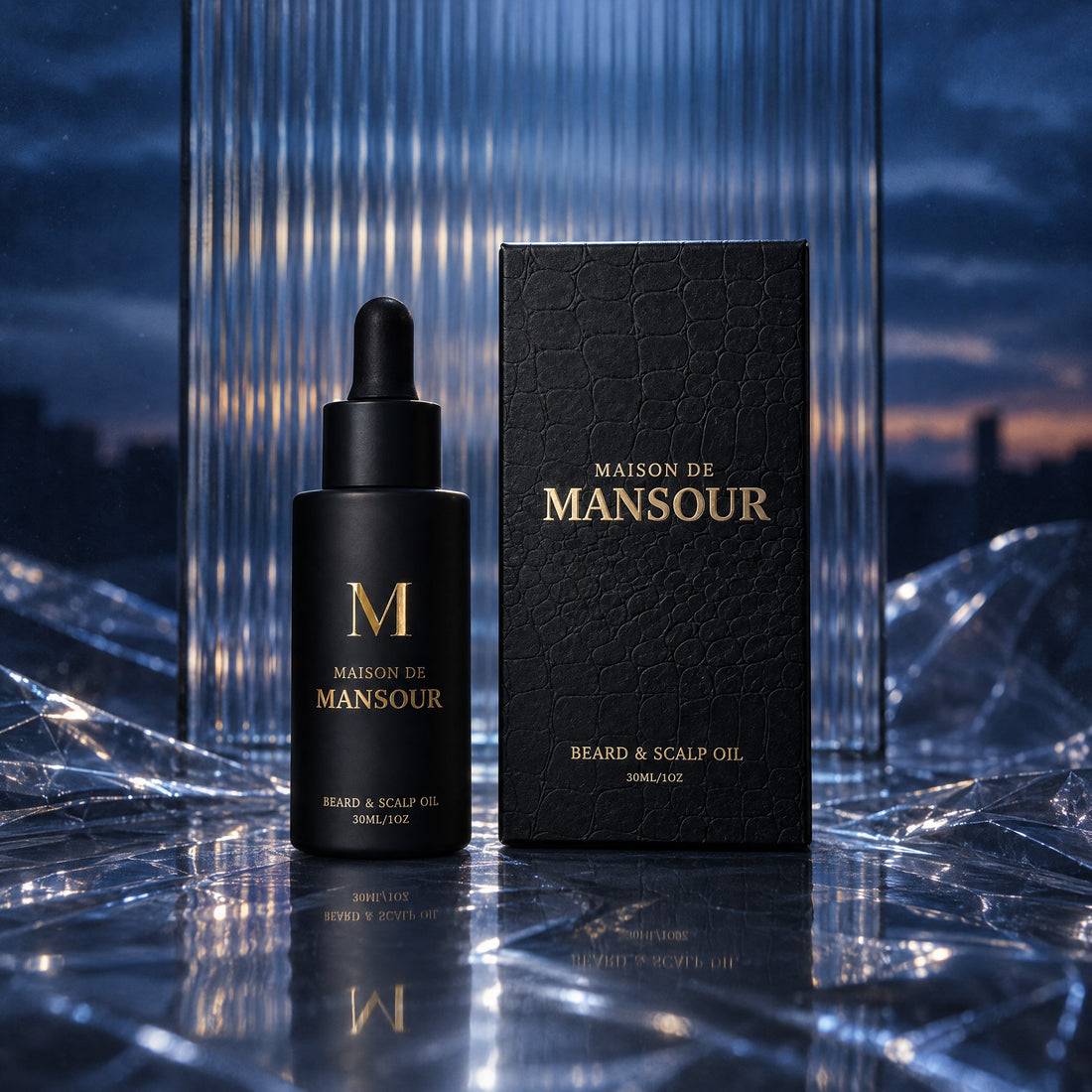 Beard & Scalp Oil bottle beside its Maison de Mansour gift box on ribbed glass
